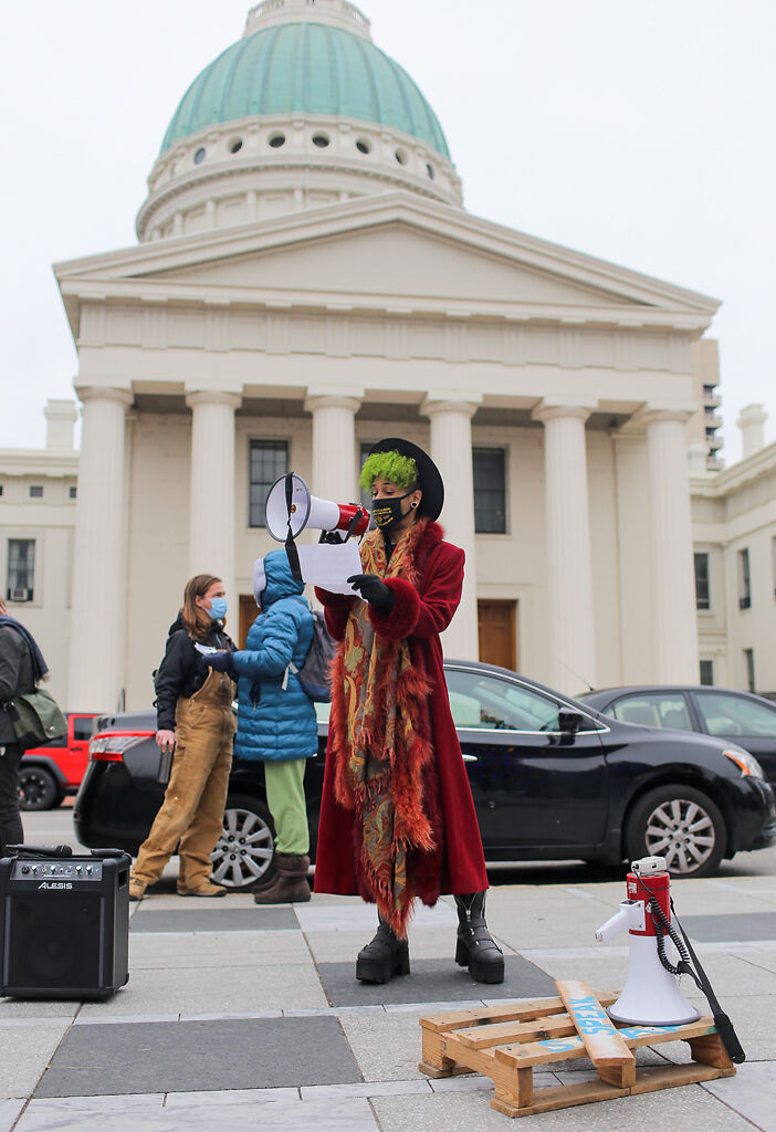 St. Louis community organizer and artist Maxi Glamour reads a speech they wrote
